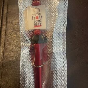 Red and Black Decorative Pen